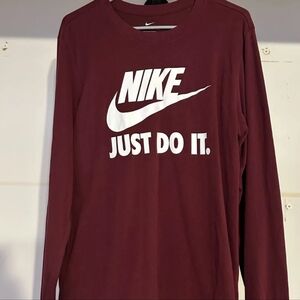 This is a Nike Sportswear men's long-sleeved shirt